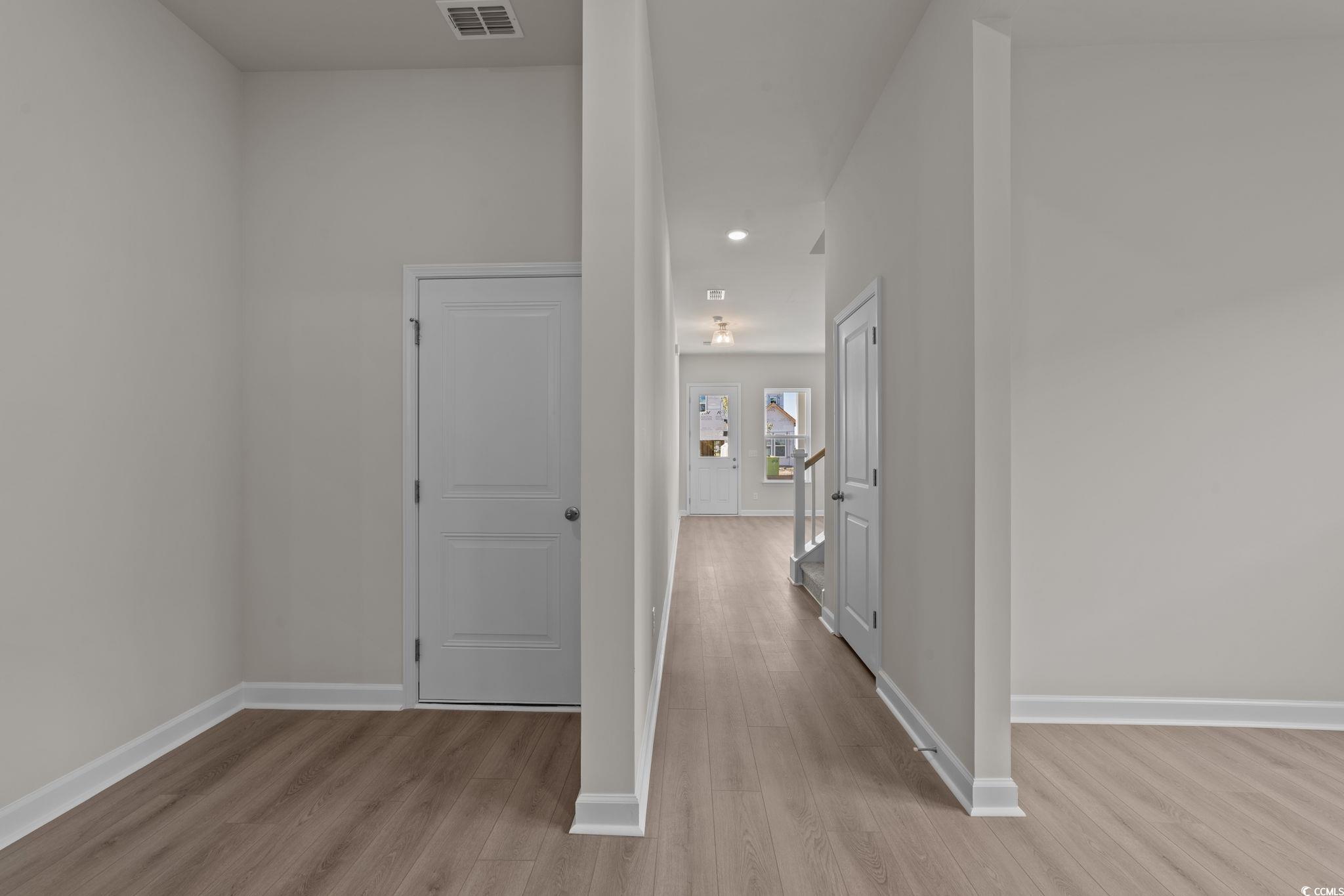 775 Ebb Tide Road Little River, SC 29566 - Photo 28 of 39 Corridor featuring light wood-type flooring and recessed lighting