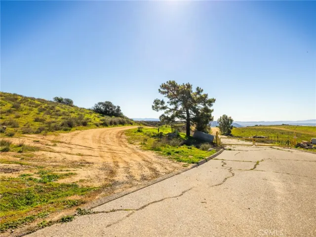 a view of mountain and an ocean