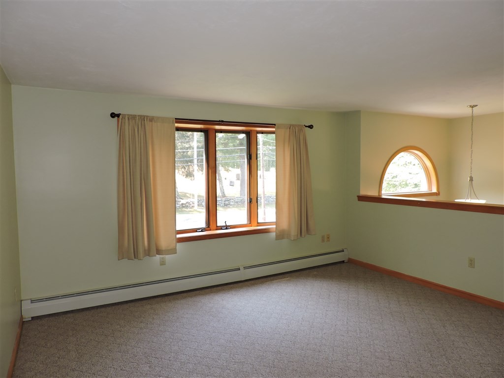 15 Lower Gore Road Webster, MA 01570 - Photo 11 of 30 an empty room with a window