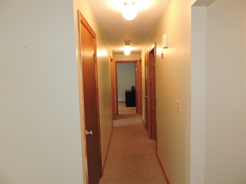 15 Lower Gore Road Webster, MA 01570 - Photo 14 of 30 a view of a hallway with a bathroom