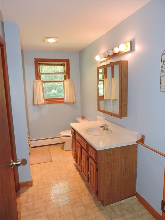15 Lower Gore Road Webster, MA 01570 - Photo 15 of 30 a bathroom with a sink and a mirror