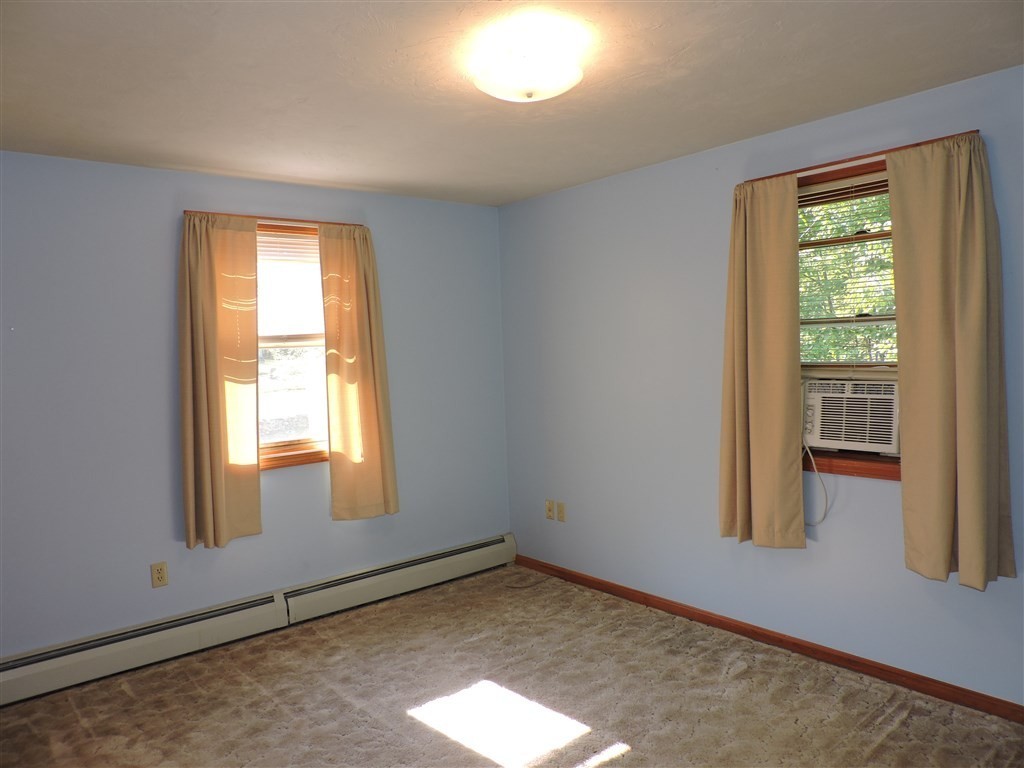 15 Lower Gore Road Webster, MA 01570 - Photo 19 of 30 an empty room with windows