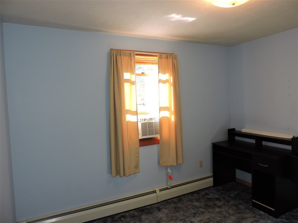15 Lower Gore Road Webster, MA 01570 - Photo 21 of 30 a view of an empty room and window