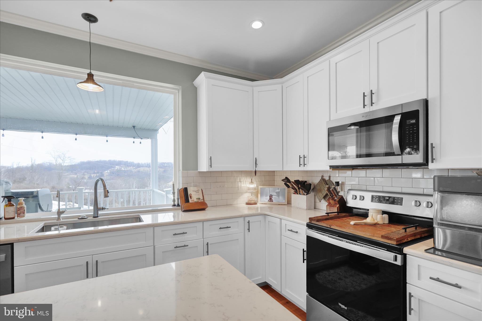 120 Great Bend Way Reading, PA 19608 - Photo 11 of 52 a kitchen with a sink stove and microwave