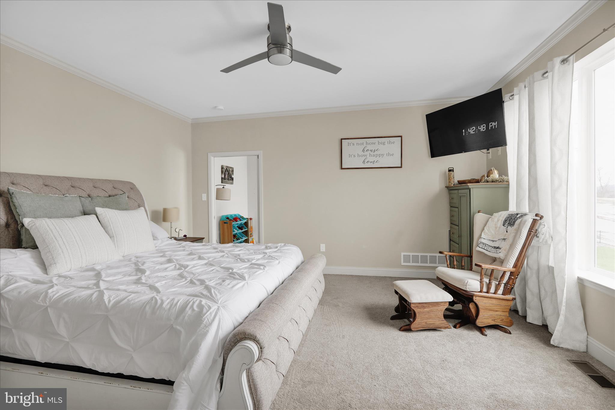 120 Great Bend Way Reading, PA 19608 - Photo 19 of 52 a bedroom with a bed a couch and a window