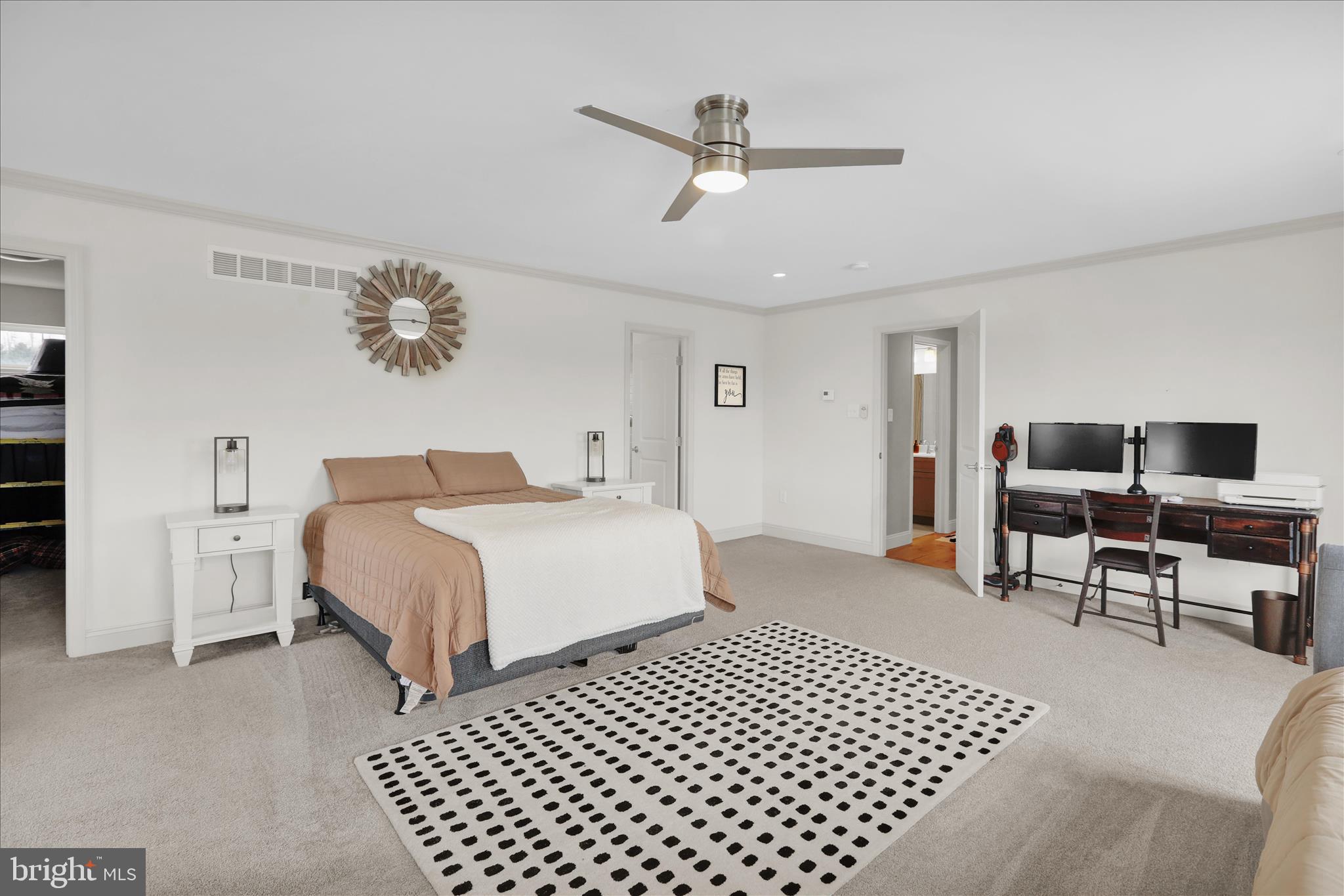 120 Great Bend Way Reading, PA 19608 - Photo 34 of 52 a bedroom with a bed and a chandelier