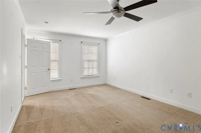 an empty room with windows