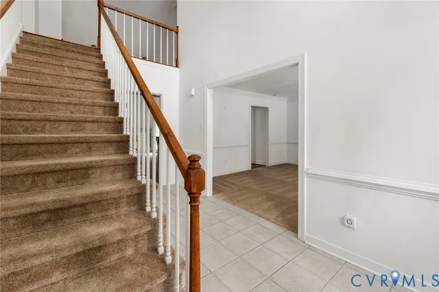 a view of an empty room with windows