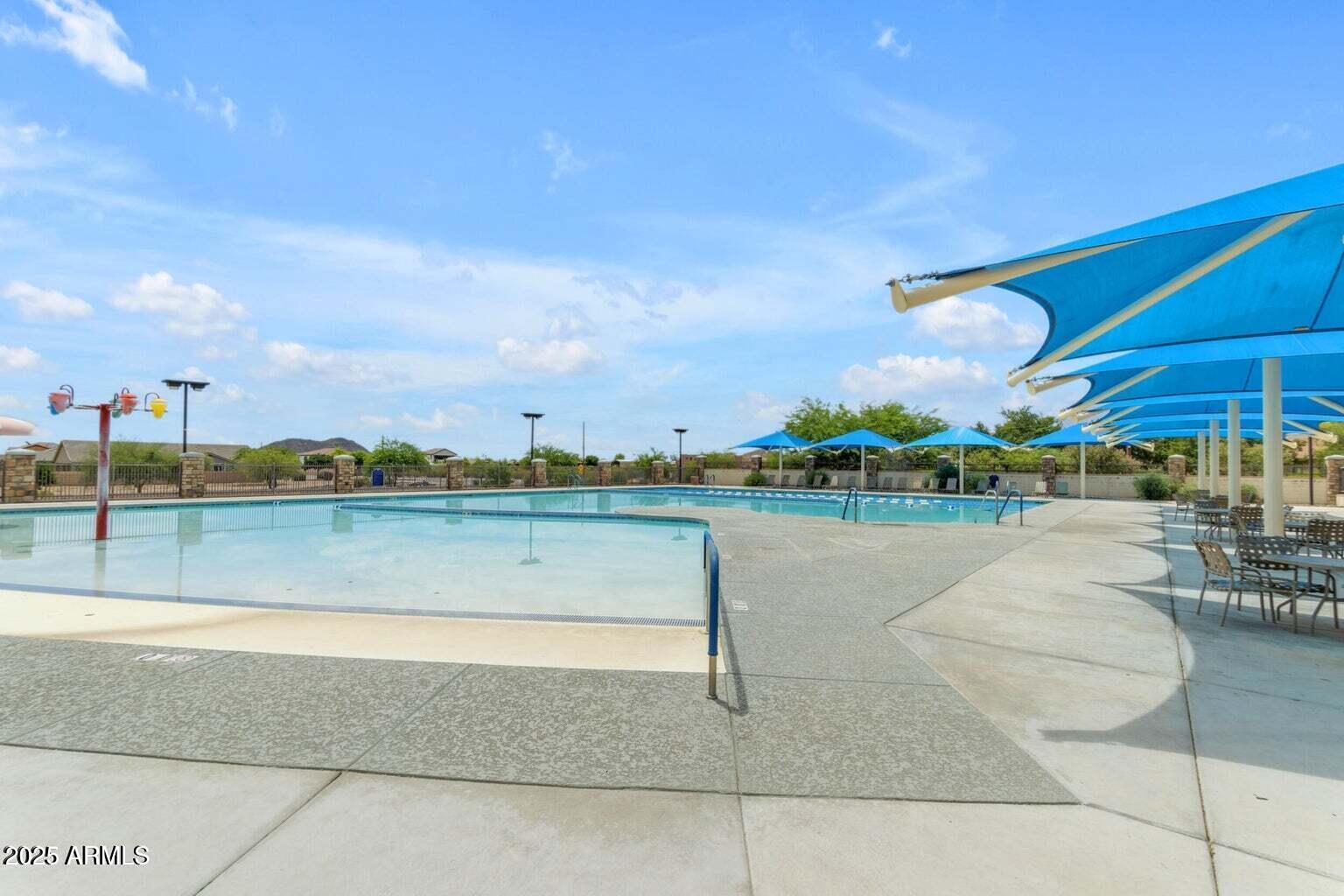 2496 West Tanner Ranch Road San Tan Valley, AZ 85144 - Photo 23 of 25 a view of swimming pool and lake view