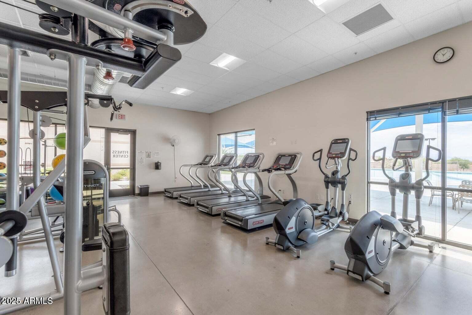 2496 West Tanner Ranch Road San Tan Valley, AZ 85144 - Photo 24 of 25 a view of a room with gym equipment
