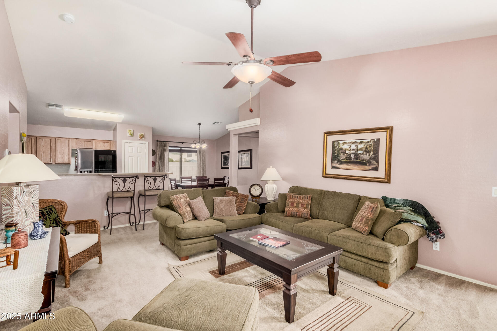 2496 West Tanner Ranch Road San Tan Valley, AZ 85144 - Photo 6 of 25 a living room with furniture and a ceiling fan