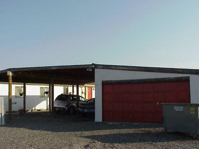 6414 Postma Road Yakima, WA 98901 - Photo 3 of 9 a black and white building with black outdoor space