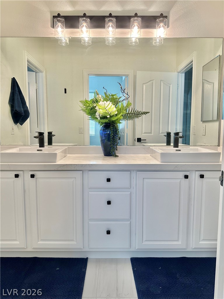 9996 Liberty View Road Las Vegas, NV 89148 - Photo 45 of 64 GUEST BATH DUAL SINKS.