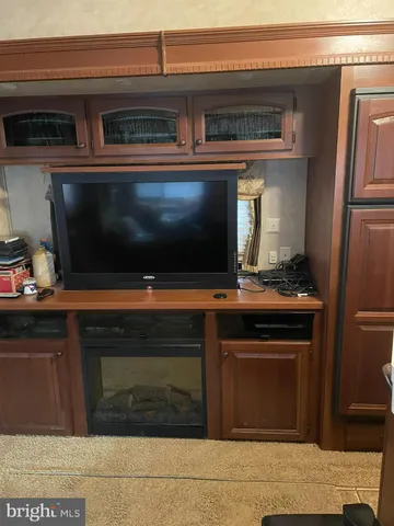 a kitchen with a stove and a microwave