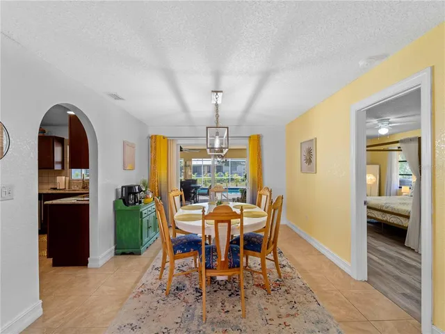 a kitchen with stainless steel appliances a refrigerator and a stove