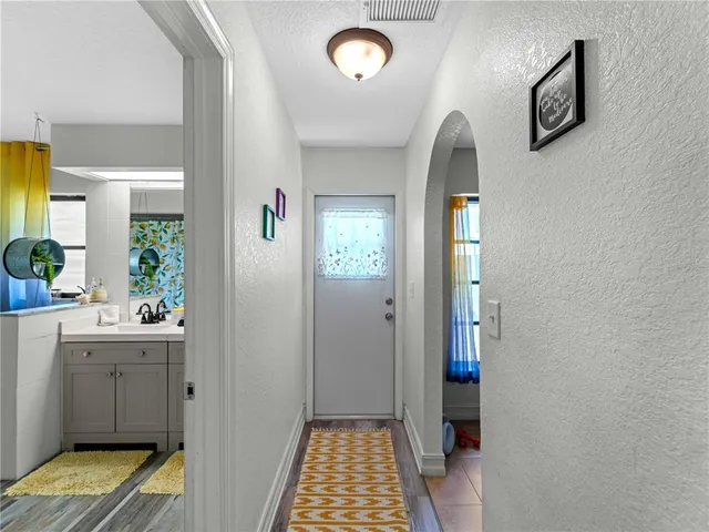 a view of a swimming pool with a patio