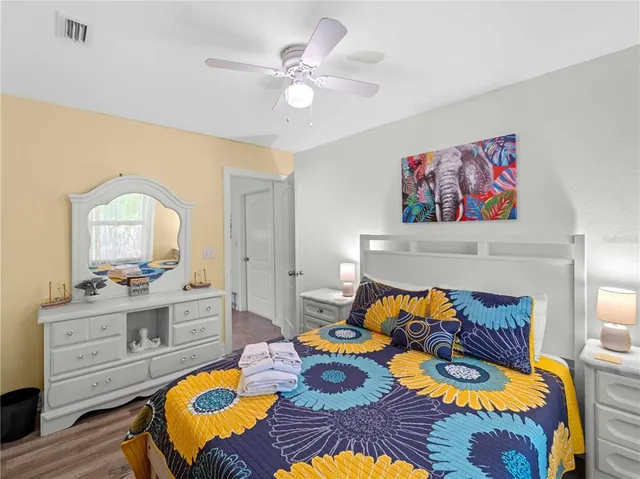 a view of a swimming pool with outdoor seating