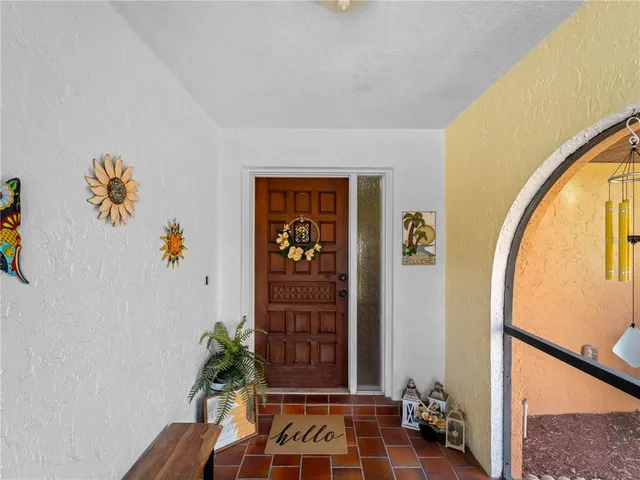 a view of a livingroom with furniture and cabinet