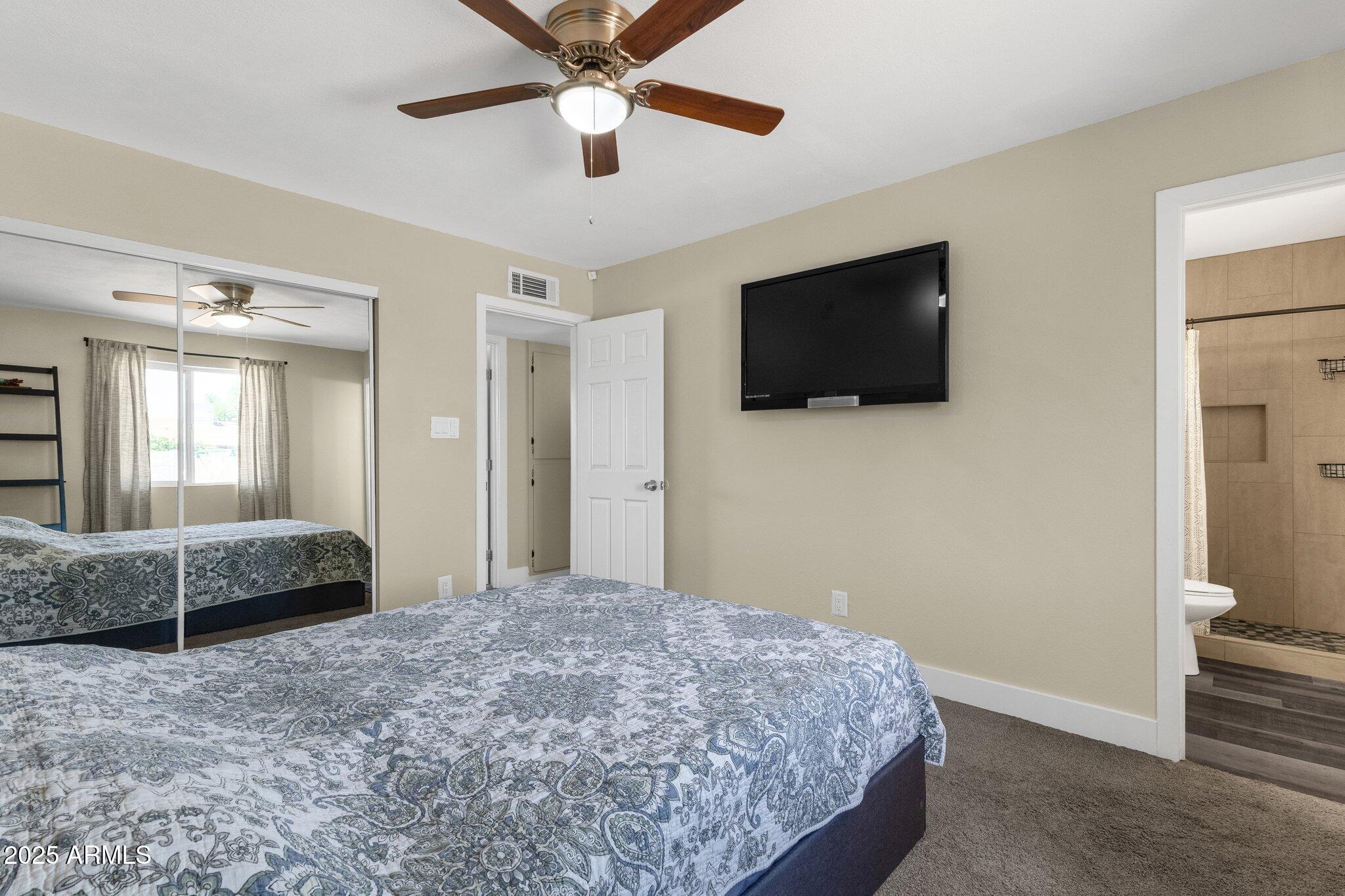 3116 West Calavar Road Phoenix, AZ 85053 - Photo 19 of 30 Primary Bedroom