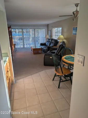 a workspace with furniture and a window
