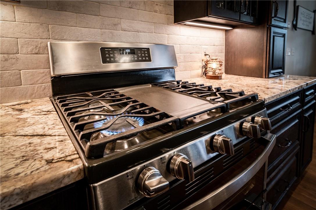 8486 Monbo Road Catawba, NC 28609 - Photo 13 of 48 a stove top oven sitting inside of a kitchen