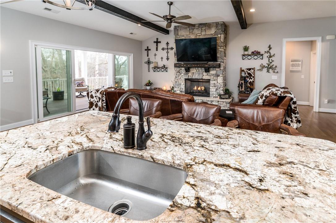 8486 Monbo Road Catawba, NC 28609 - Photo 14 of 48 a kitchen with a sink and a stove top oven