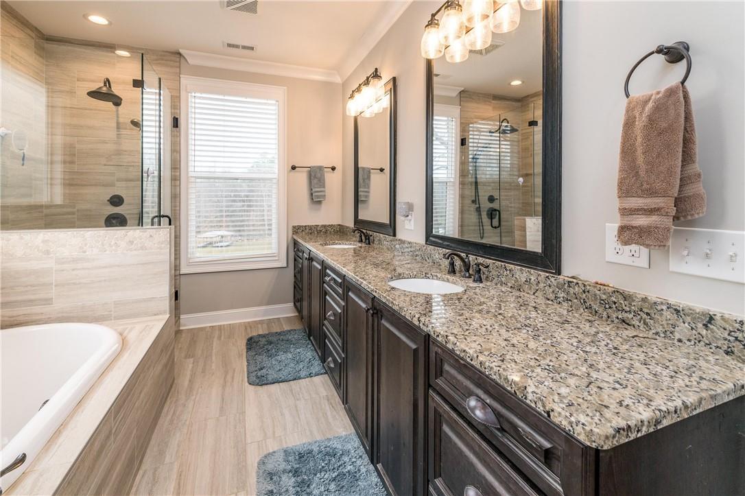 8486 Monbo Road Catawba, NC 28609 - Photo 19 of 48 a bathroom with a granite countertop sink and a mirror