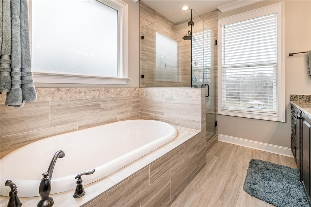 8486 Monbo Road Catawba, NC 28609 - Photo 20 of 48 a bathroom with a bathtub and a sink
