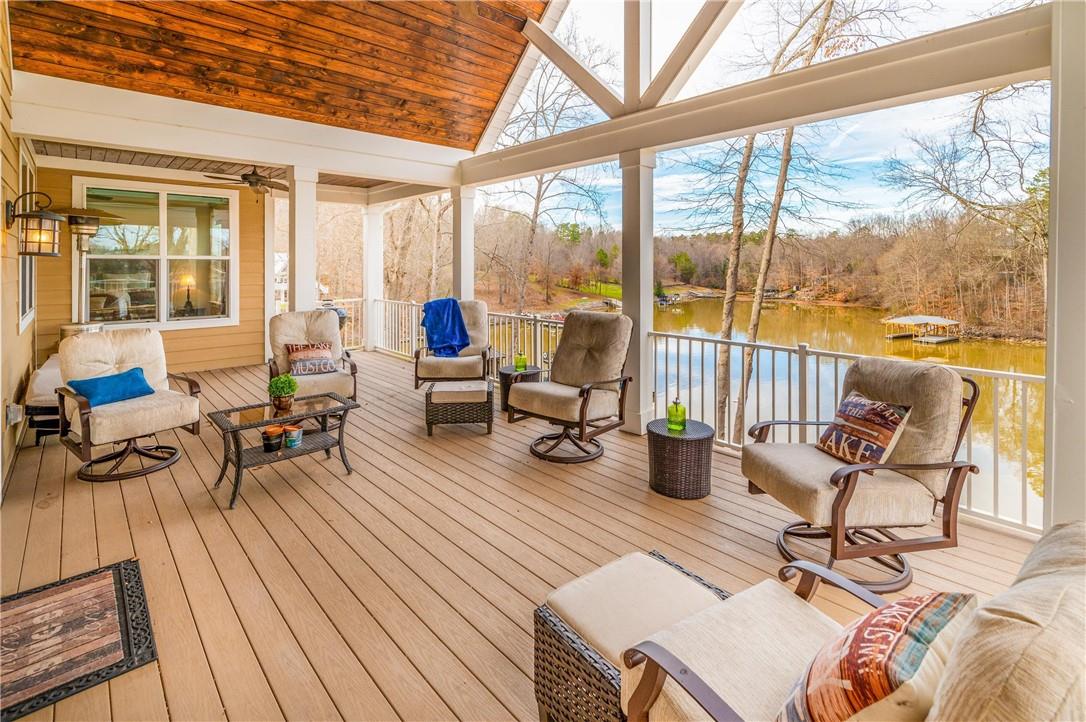 8486 Monbo Road Catawba, NC 28609 - Photo 42 of 48 a living room with furniture and floor to ceiling windows