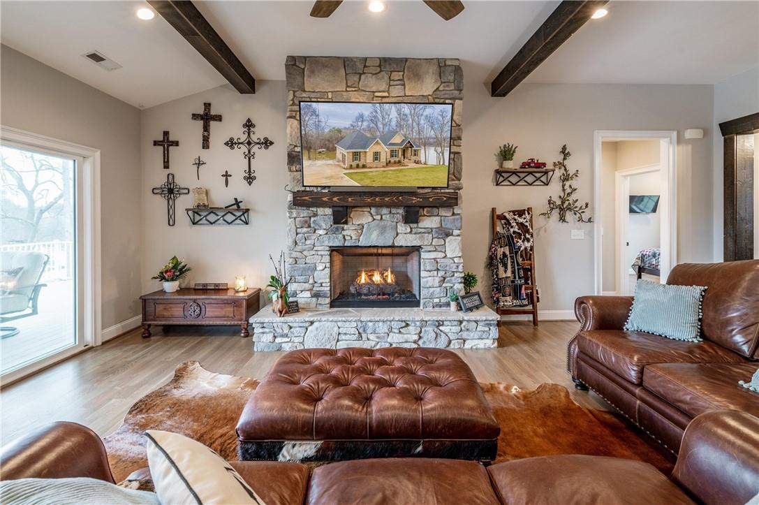 8486 Monbo Road Catawba, NC 28609 - Photo 10 of 48 a living room with furniture and a fireplace