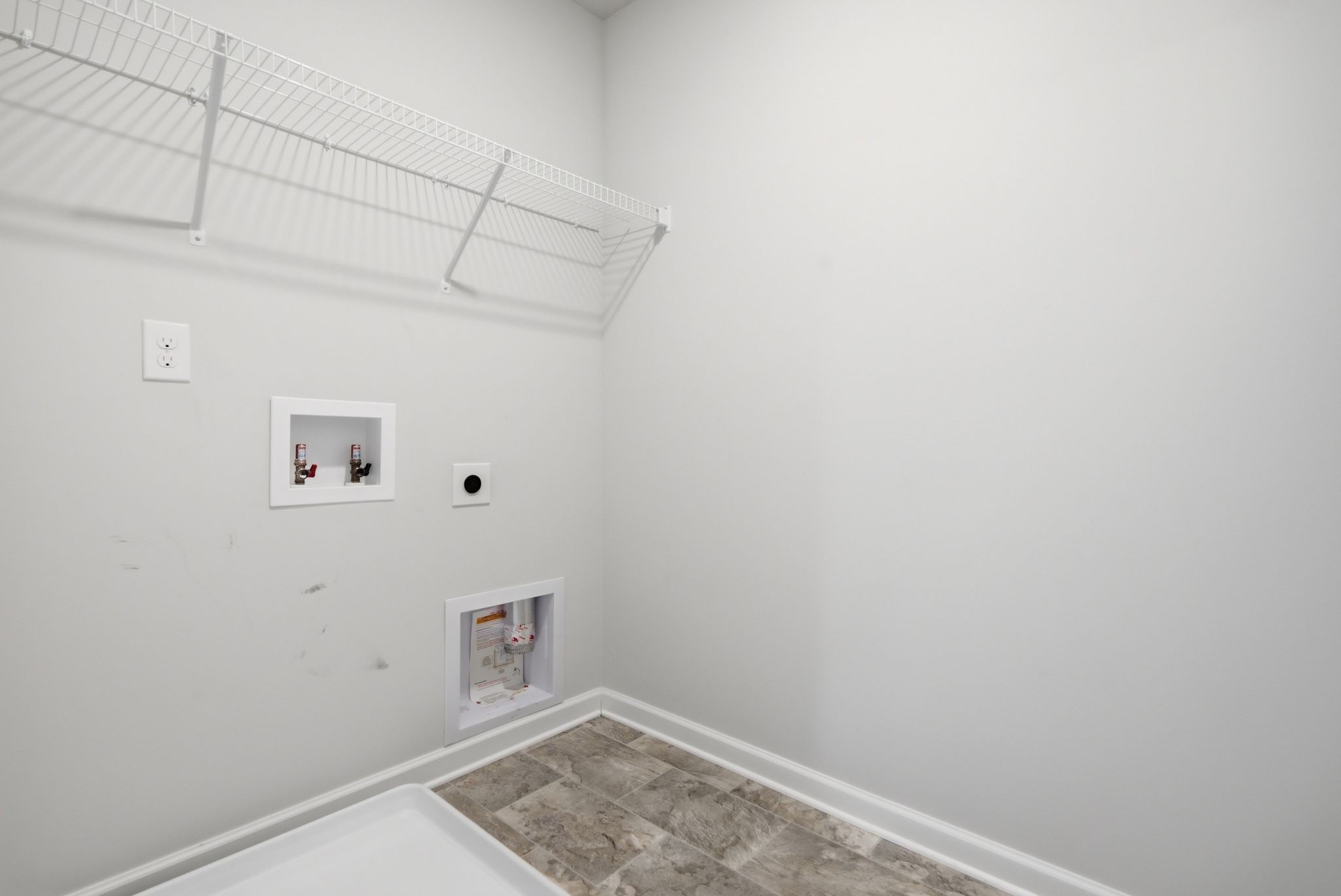 514 Ash Street Lebanon, TN 37087 - Photo 28 of 37 a view of small space with empty racks