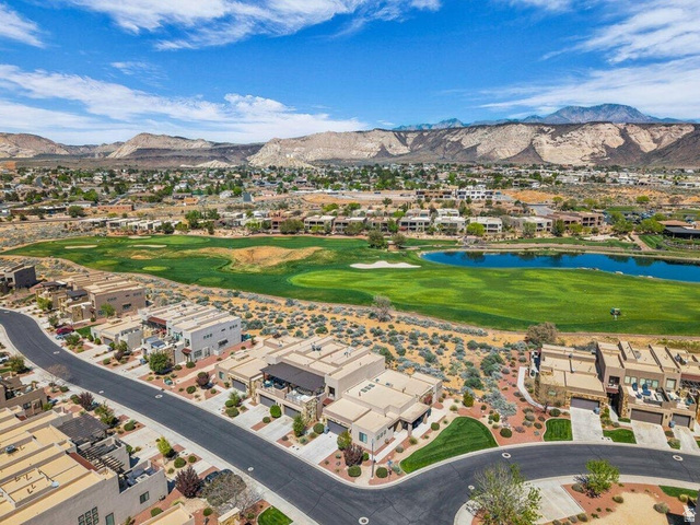 5010 Escapes Drive St. George, UT 84770 - Photo 33 of 46 Aerial perspective of suburban area featuring a golf club and a water and mountain view