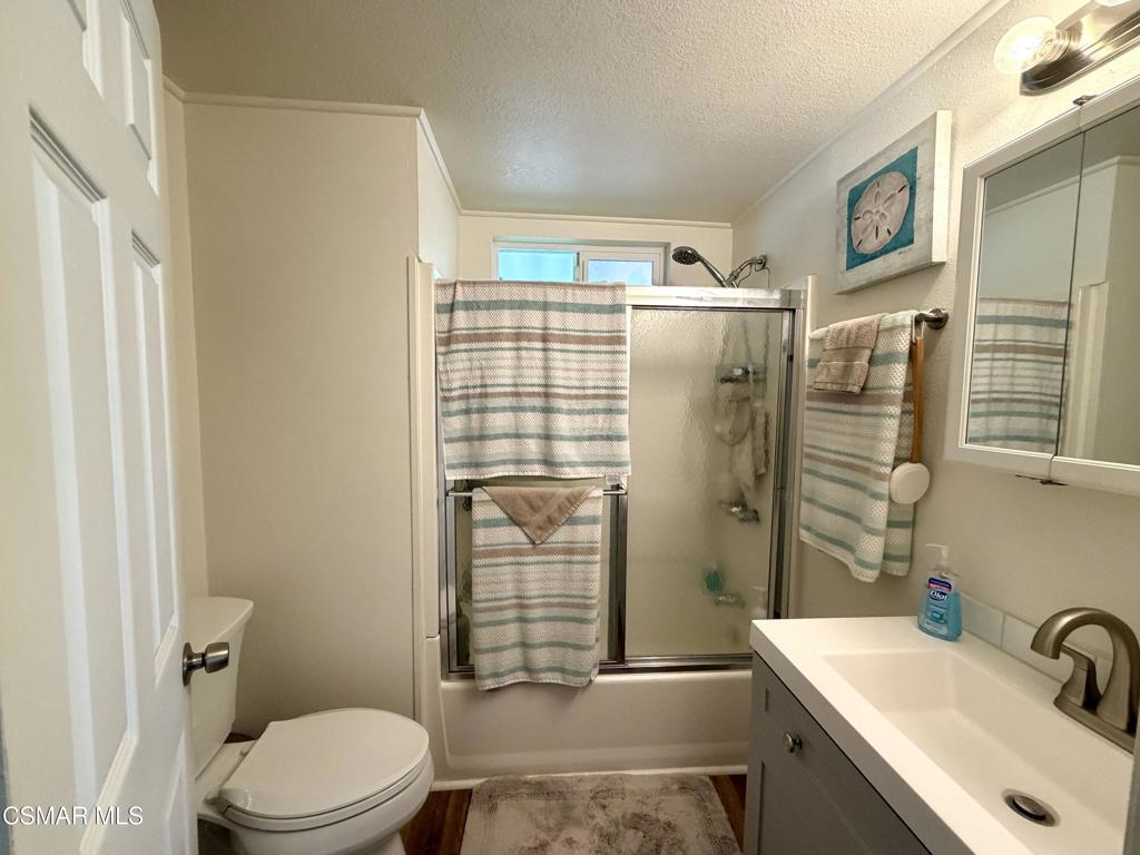 6480 Katherine Road, Unit 6 Simi Valley, CA 93063 - Photo 17 of 34 a bathroom with a sink a toilet and shower