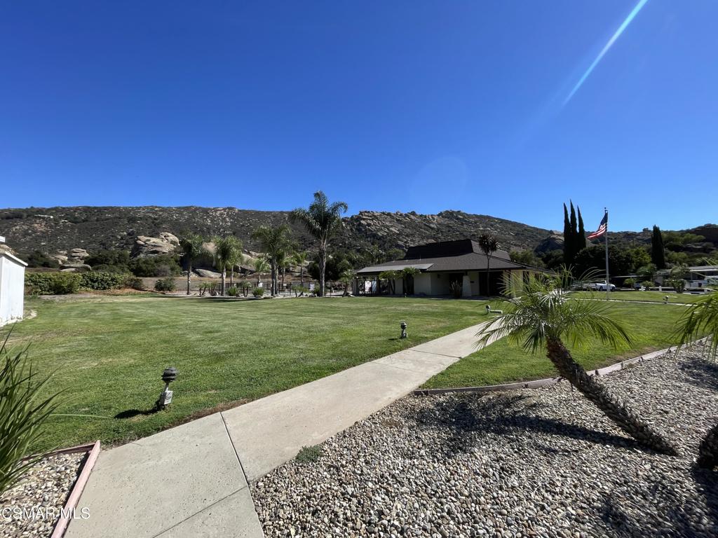 6480 Katherine Road, Unit 6 Simi Valley, CA 93063 - Photo 24 of 34 a view of a garden with a house
