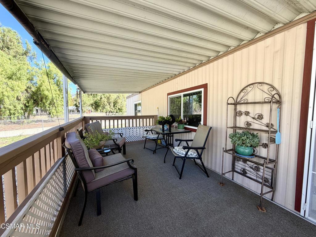 6480 Katherine Road, Unit 6 Simi Valley, CA 93063 - Photo 3 of 34 a outdoor living space with furniture