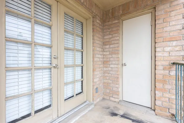 a view of a bathroom with a glass door