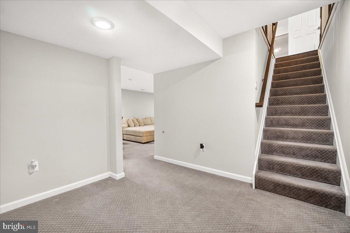 6303 Edgeware Court Frederick, MD 21703 - Photo 33 of 74 a view of room and stairs