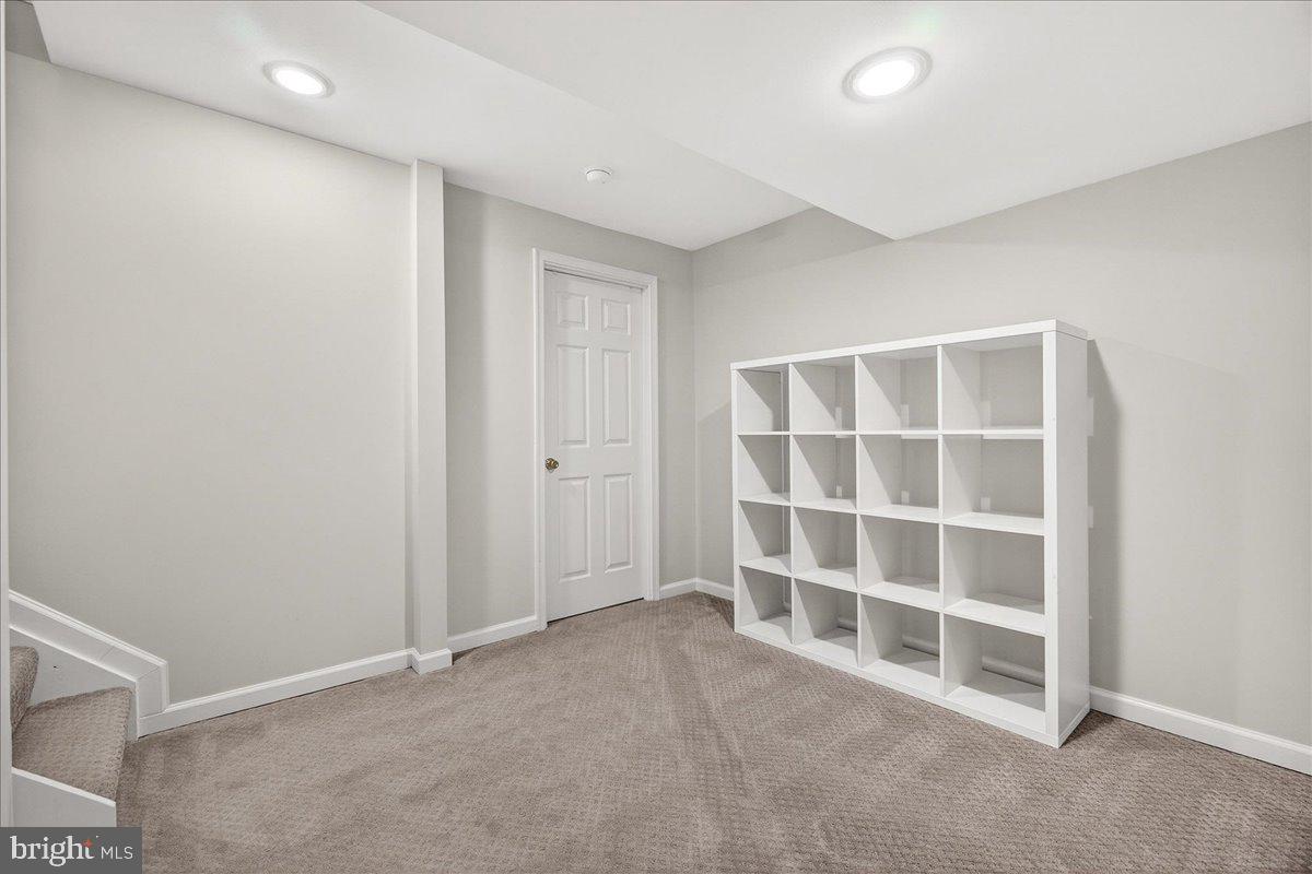 6303 Edgeware Court Frederick, MD 21703 - Photo 34 of 74 a view of an empty room with a window
