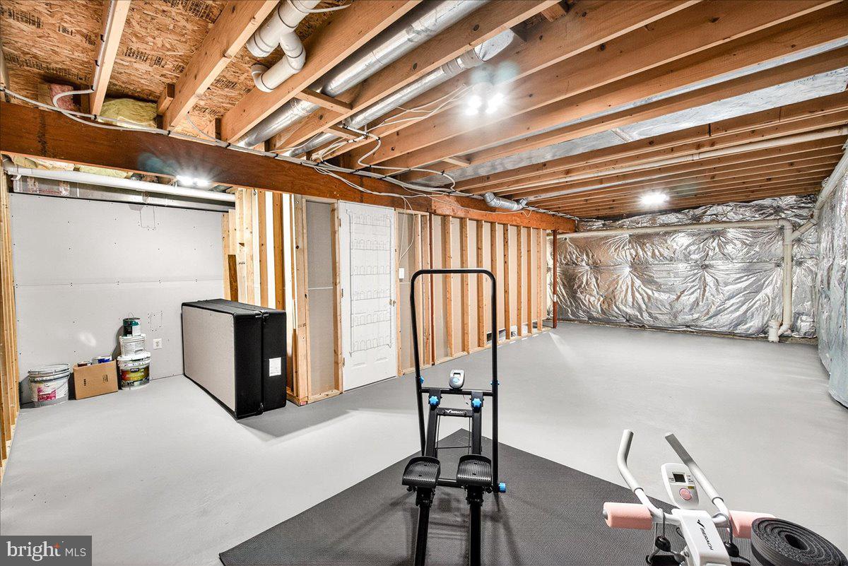 6303 Edgeware Court Frederick, MD 21703 - Photo 42 of 74 a view of a room with gym equipment