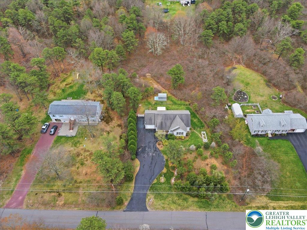 64 Robertson Road Jim Thorpe, PA 18229 - Photo 52 of 54 an aerial view of a house with a yard basket ball court and outdoor seating