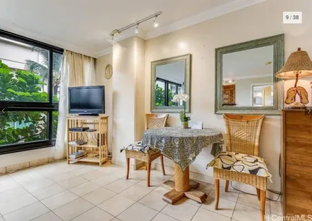 a view of a livingroom with furniture window and outside view