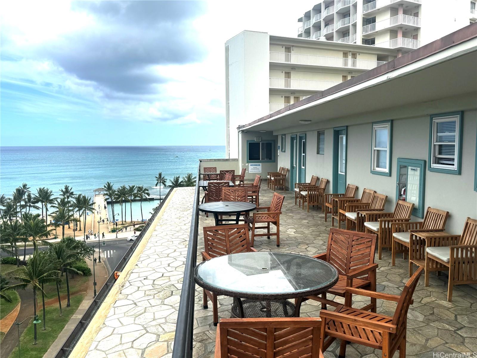 134 Kapahulu Avenue, Unit 518 Honolulu, HI 96815 - Photo 20 of 23 a terrace with outdoor seating and city view