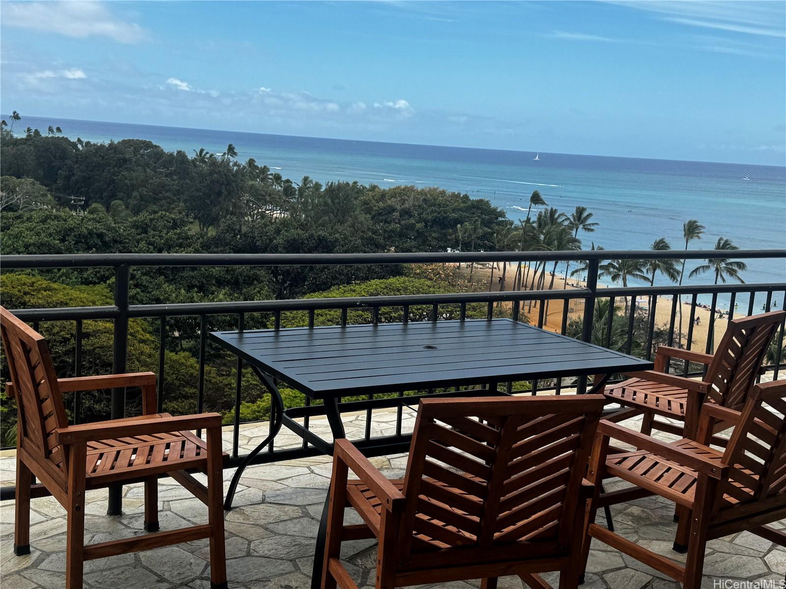 134 Kapahulu Avenue, Unit 518 Honolulu, HI 96815 - Photo 21 of 23 a terrace with outdoor seating and city view