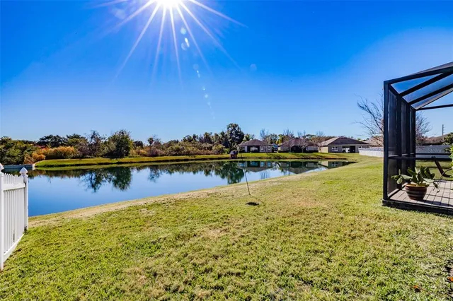 a view of a lake with a house