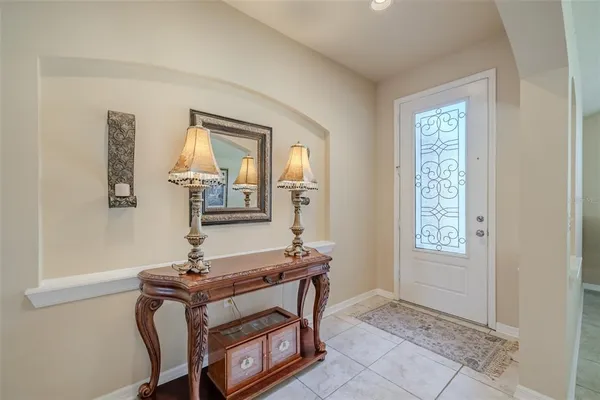 a room that has a table and a chair in it