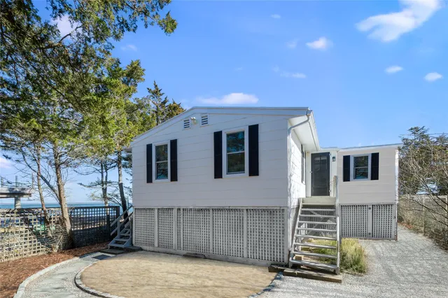 a view of a balcony with an ocean view