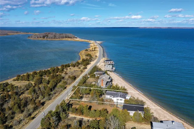 a view of a balcony with an ocean view