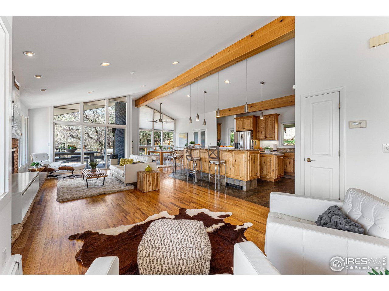 3880 Cloverleaf Drive Boulder, CO 80304 - Photo 11 of 38 a living room with furniture and a large window
