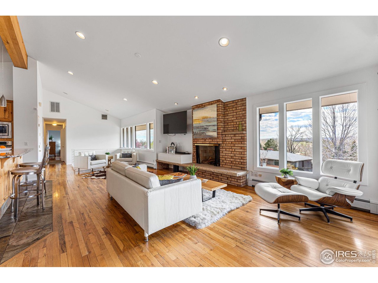 3880 Cloverleaf Drive Boulder, CO 80304 - Photo 12 of 38 a living room with furniture and a large window