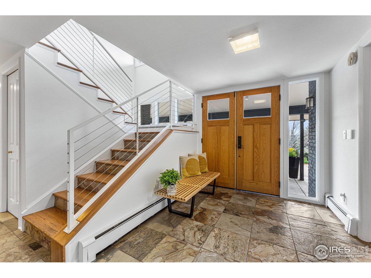 3880 Cloverleaf Drive Boulder, CO 80304 - Photo 13 of 38 a living room with furniture and stairs